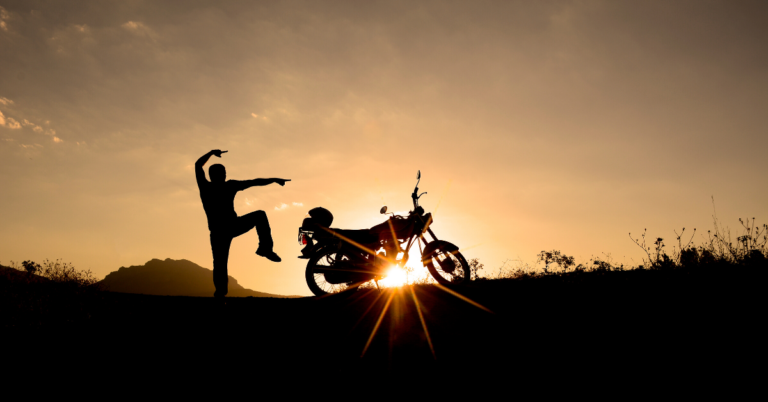 Man dancing with motorcycle